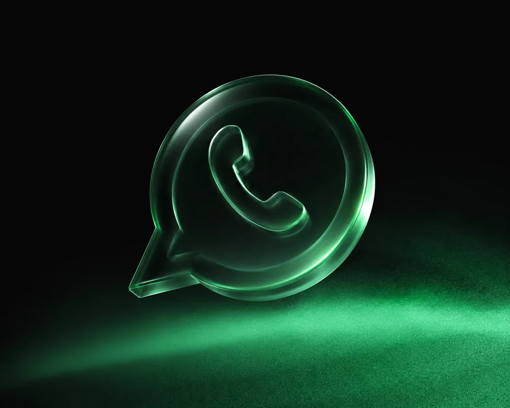 Glass WhatsApp icon glowing green, representing instant messaging replies